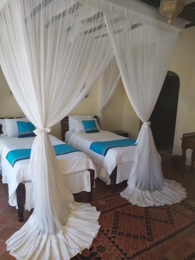 Asha Boutique Hotel Diani Beach Exterior photo